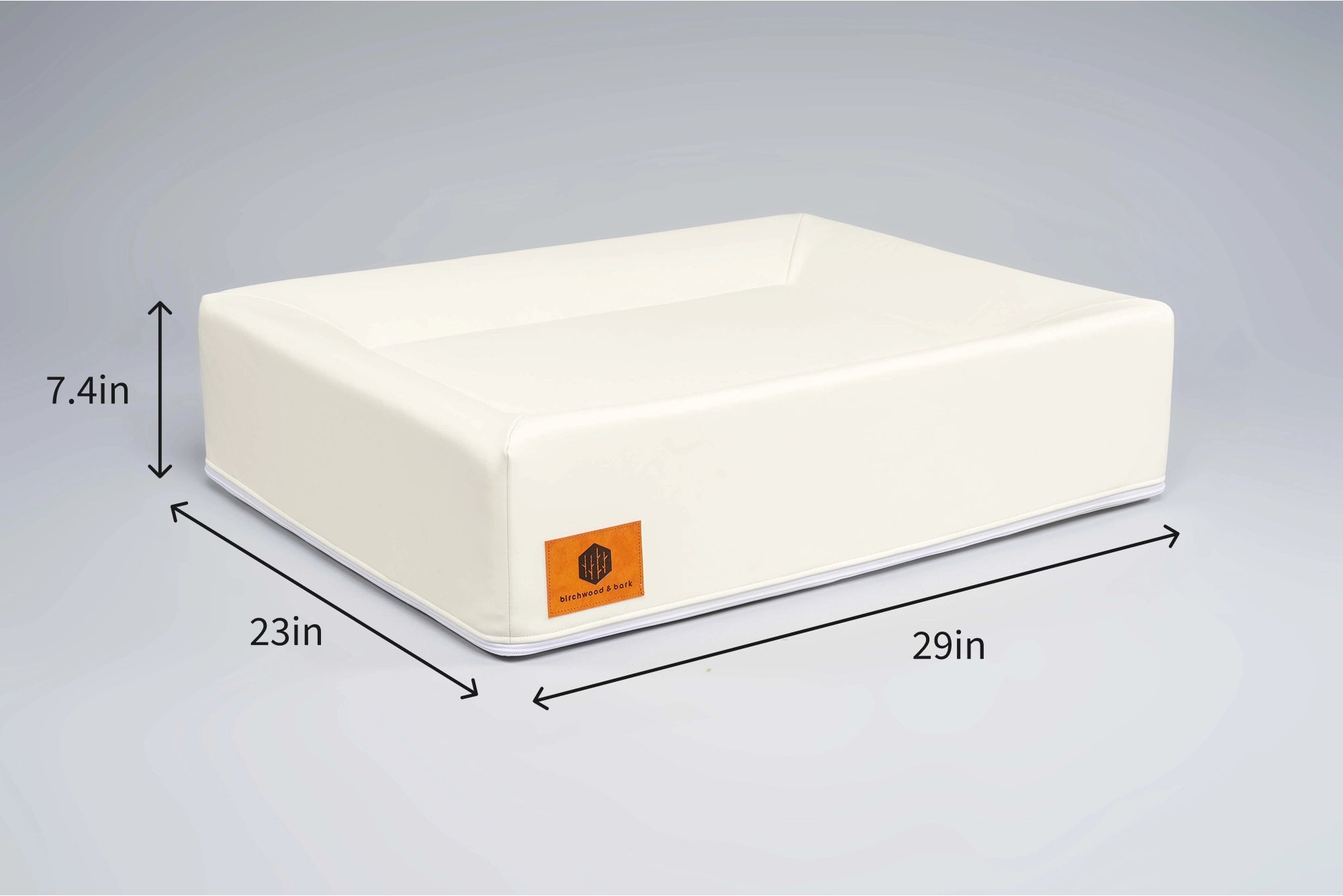 French bulldog sitting on cream Birchwood & Bark laundry-free, sustainable dog bed