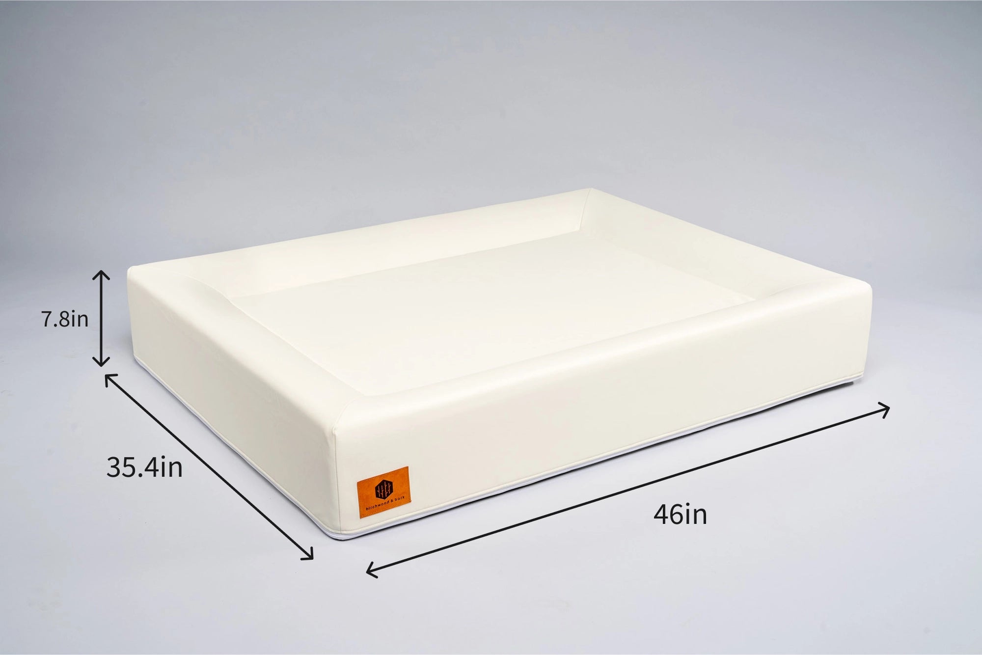 Golden retriever relaxing on cream Birchwood & Bark laundry-free, sustainable dog bed