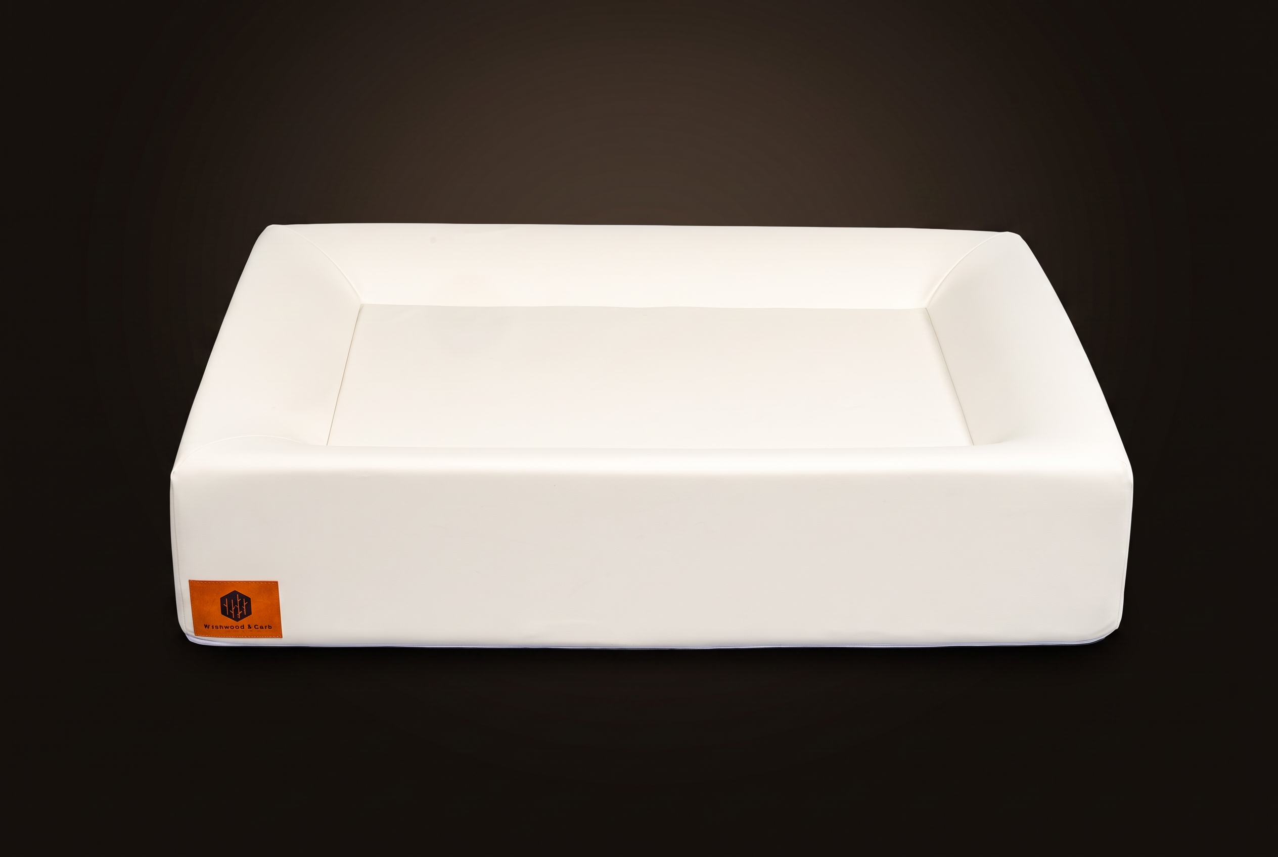 Large Birchwood & Bark dog bed, cream medical-grade composite leather shell, three-quarter view